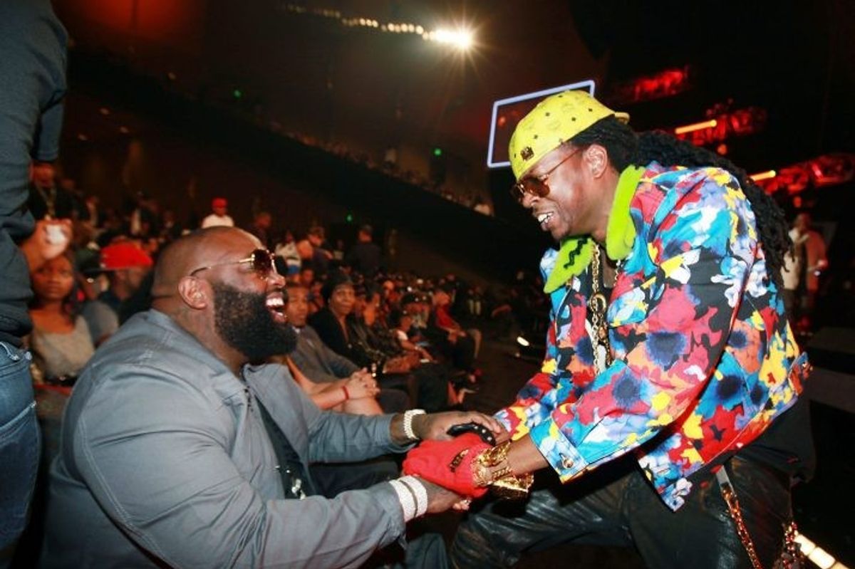 2 Chainz and Rick Ross shake hands at the 2012 BET Hip-Hop Awards