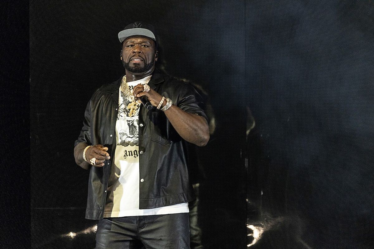 50 cent holding a mic 