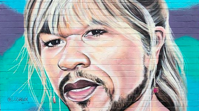 50 Cent is at War with an Anonymous Street Artist Over These Hilarious Murals