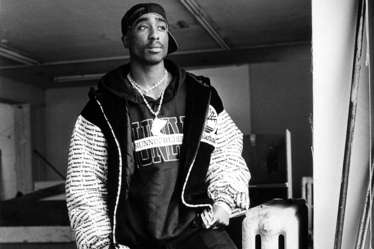 A black and white photo of 2Pac. 