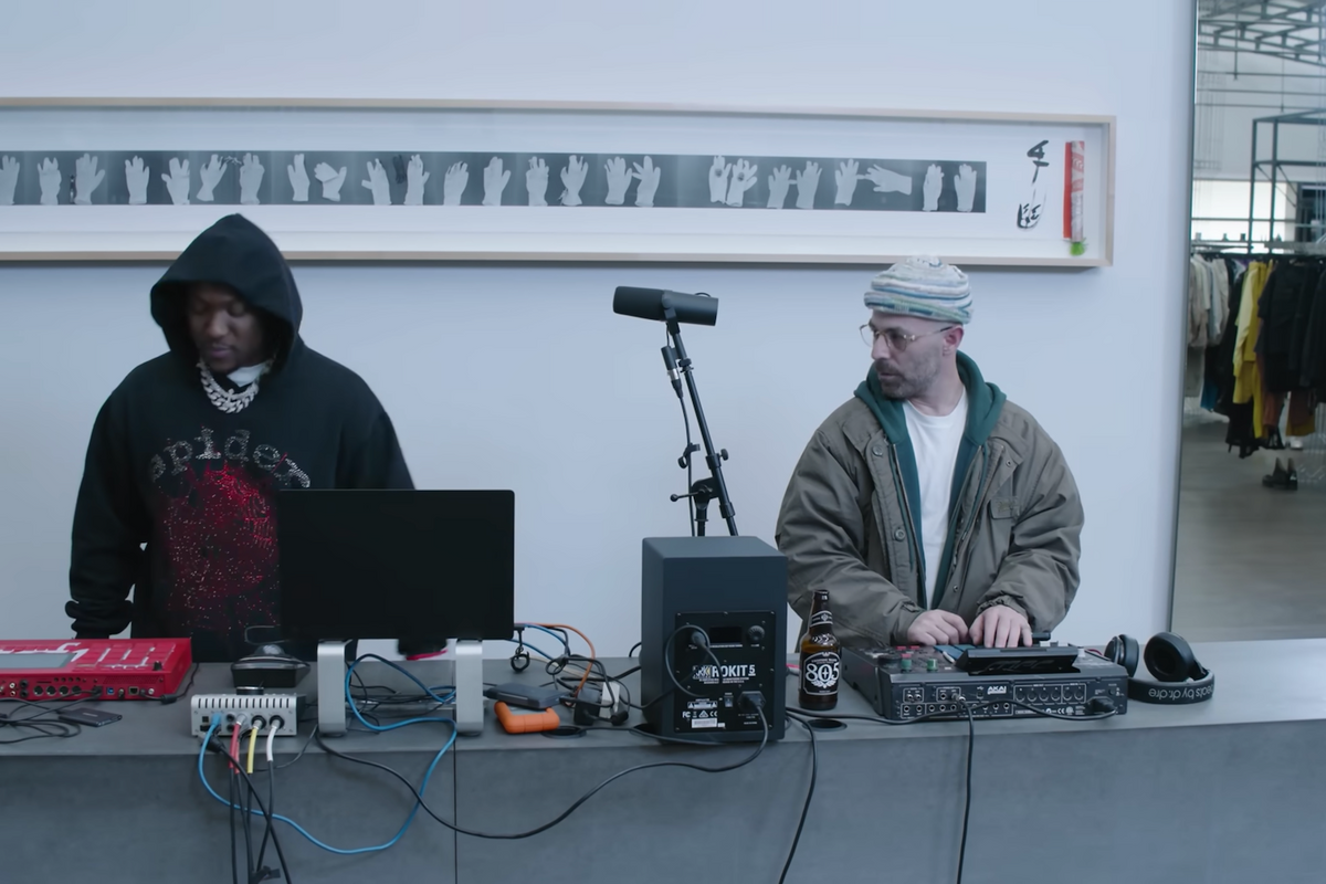 Alchemist and Hit-Boy in the video for their new single "Slipping into Darkness."