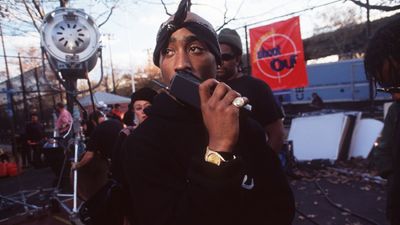 American rapper Tupac Shakur on the set of "Above the Rim" in Harlem. (Photo by mark peterson/Corbis via Getty Images)