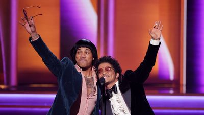 Anderson .Paak and Bruno Mars of Silk Sonic accept the Record Of The Year award for ‘Leave The Door Open’ onstage during the 64th Annual GRAMMY Awards at MGM Grand Garden Arena on April 03, 2022 in Las Vegas, Nevada.