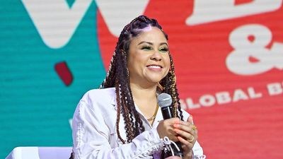 Angela Yee onstage at the 2022 Essence Festival