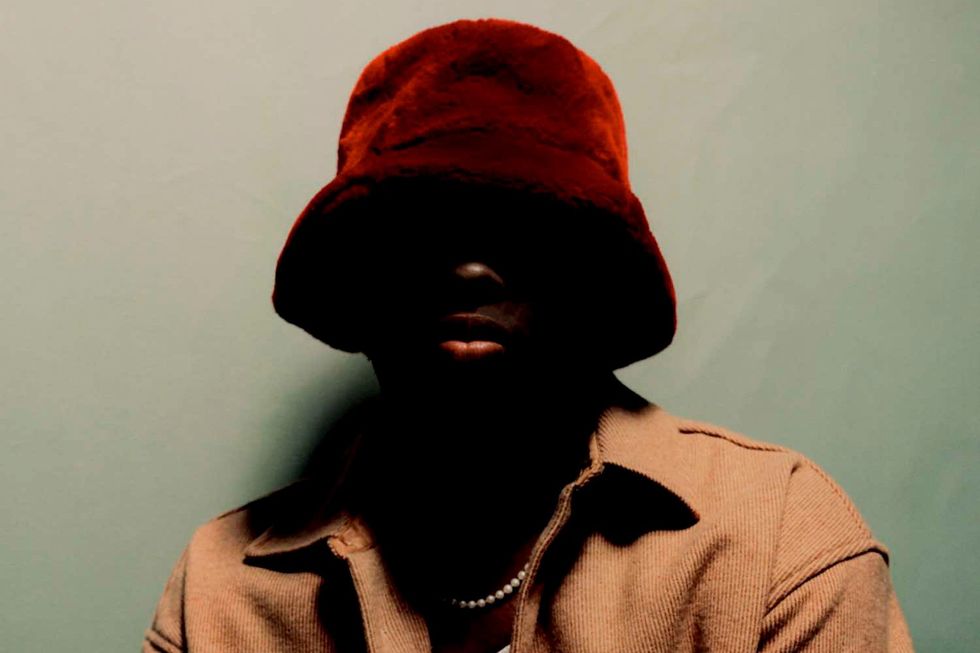 BLK ODYSSY in red hat.