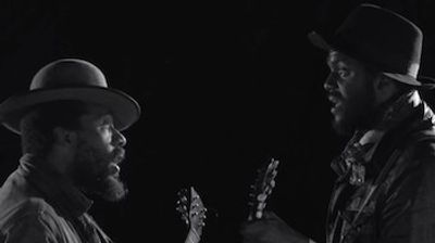 Cody Chesnutt & Gary Clark Jr. Pay Tribute To U.S. Troops On Veterans Day With The Official Video For "Gunpowder On The Letter" From ChesnuTT's 'Landing On A Hundred: B-Sides And Rarities' LP.