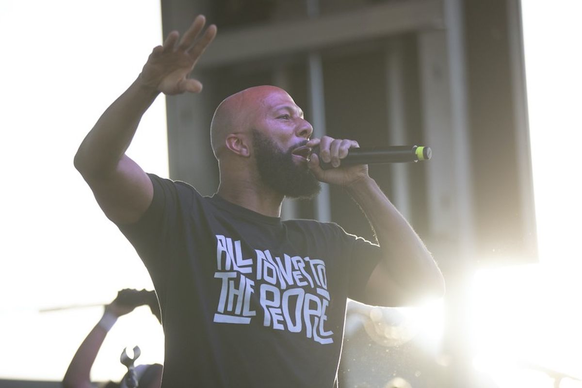 Common performs on stage with The Sounds of Blackness during the 1 year anniversary of the death of George Floyd