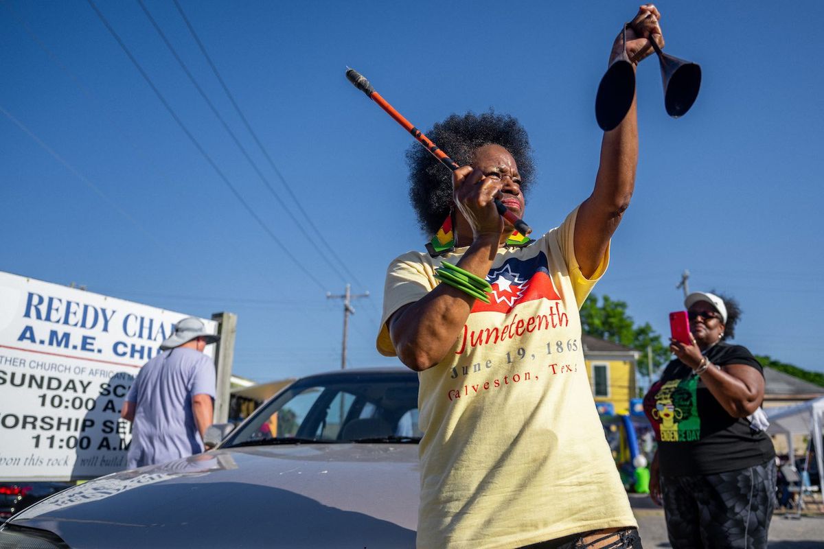 Community member Jackie Douglas celebrates after residents marched from the Galveston County Courthouse on June 19, 2022 in Galveston, Texas. Galveston island is the birthplace of Juneteenth, the oldest known nationally celebrated event commemorating the end of slavery in the United States.
