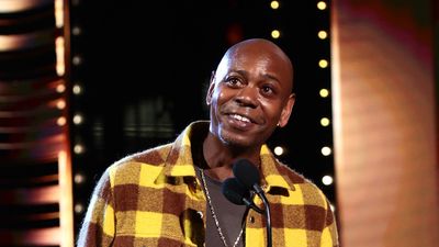 Dave Chappelle speaks onstage during the 36th Annual Rock & Roll Hall Of Fame Induction Ceremony at Rocket Mortgage Fieldhouse on October 30, 2021 in Cleveland, Ohio.