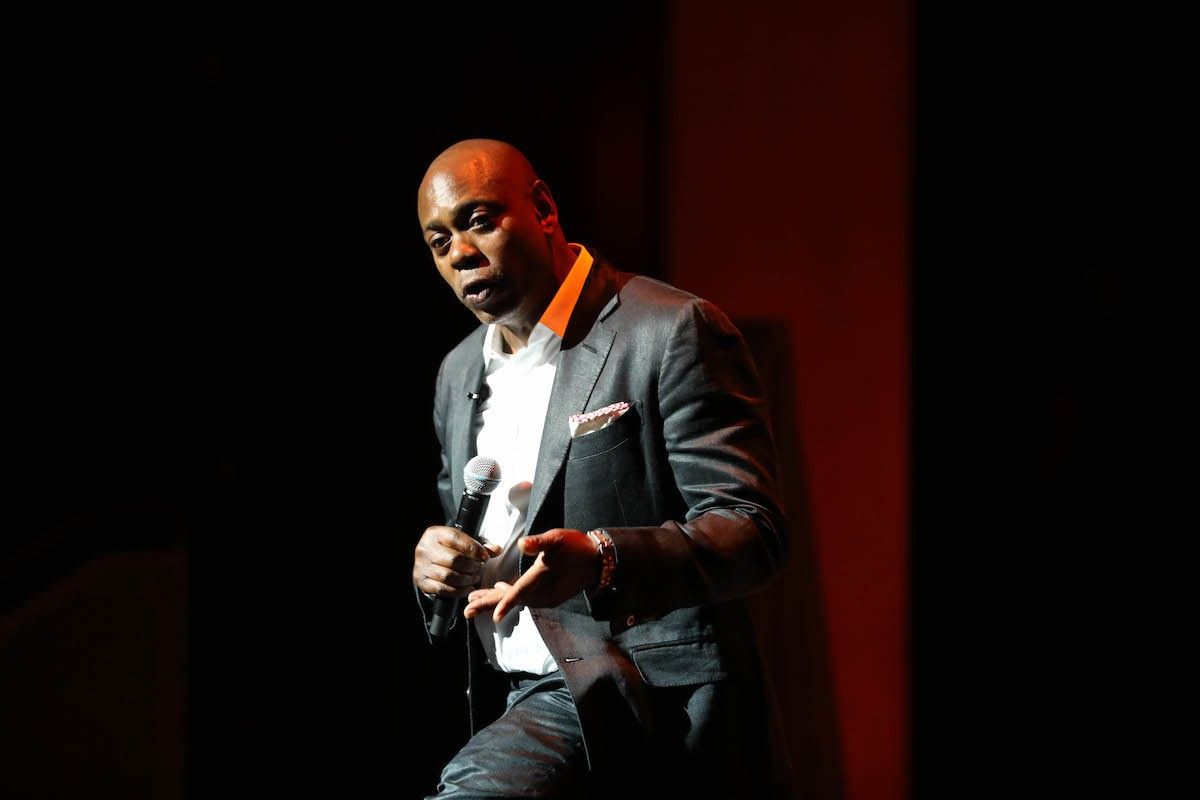 Dave Chappelle speaks onstage during the Dave Chappelle theatre dedication ceremony at Duke Ellington School of the Arts on June 20, 2022 in Washington, DC.