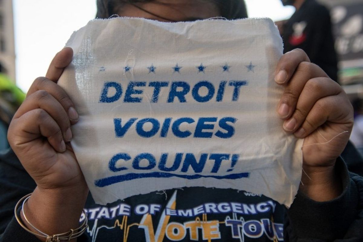 Detroit activists march to fight trump from stealing the election