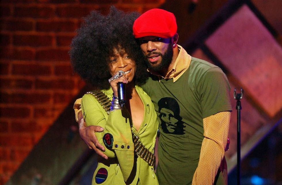 Erykah Badu and Common wearing green and red hat