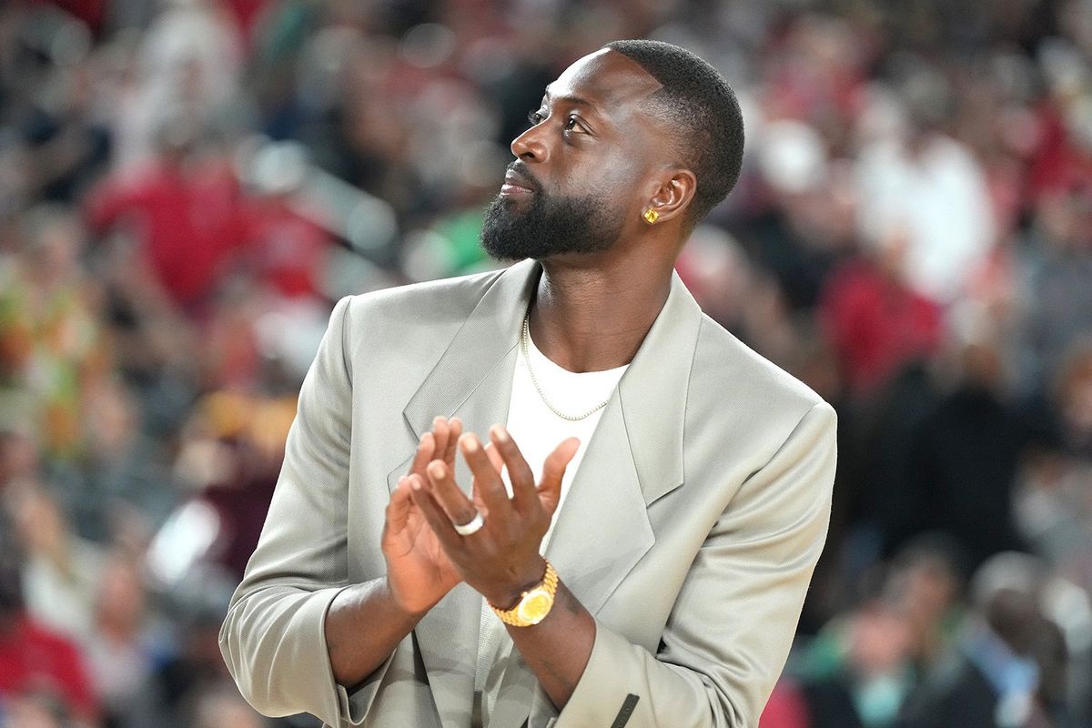 Former college basketball and NBA player Dwayne Wade is recognized at half time as new inductee to the Naismith basketball Hall Of Fame during the NCAA Men's Basketball Tournament Final Four semifinal game against the San Diego Aztecs at NRG Stadium on April 01, 2023 in Houston, Texas. (Photo by Mitchell Layton/Getty Images)