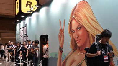 GTA fans line up outside a booth picturing the iconic swimsuit girl from the GTA V loading screens