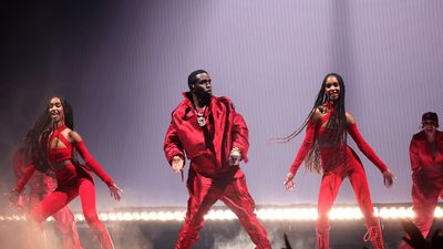 Diddy wearing all red performing 