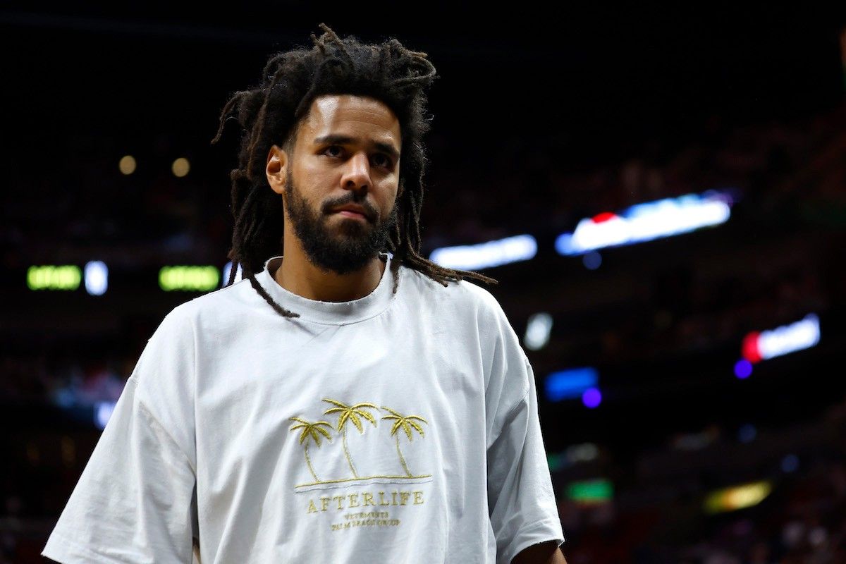 J Cole is seen in attendance during Game Three of the 2023 NBA Finals between the Denver Nuggets and the Miami Heat at Kaseya Center on June 07, 2023 in Miami, Florida.