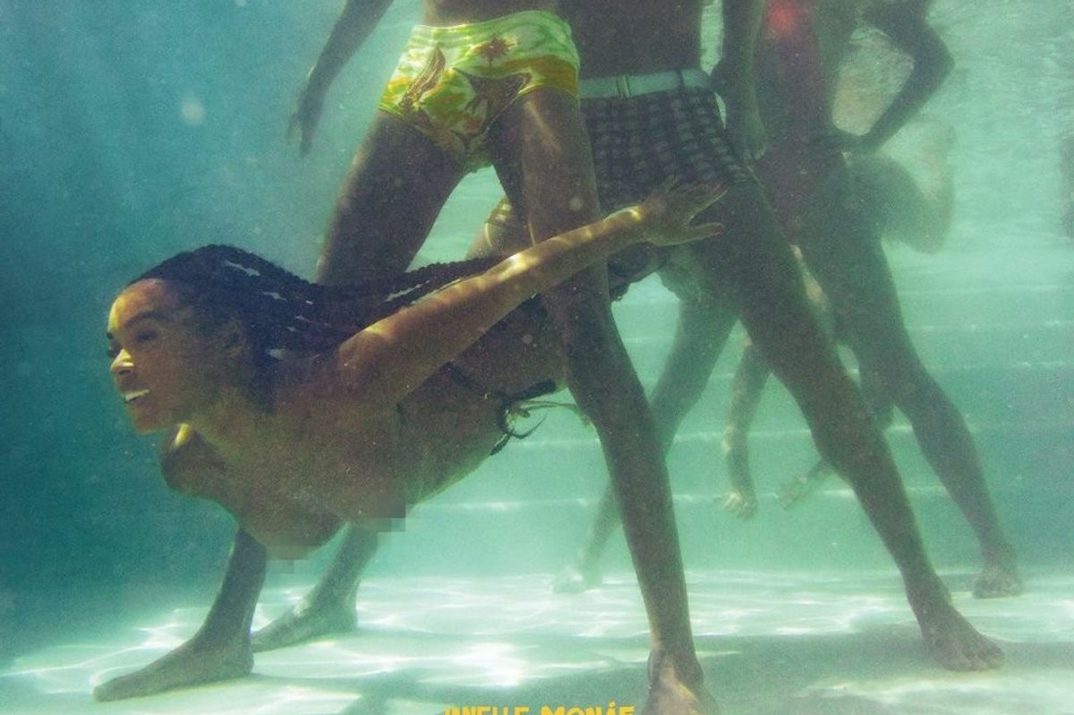 Janelle Monáe swiming under water