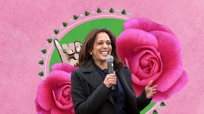 Kamala Harris holding mic in front of pink flower