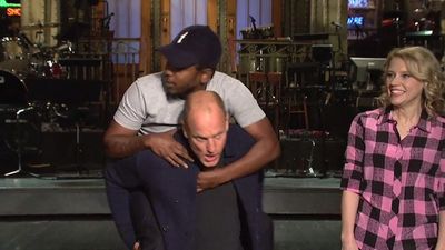 Kendrick Lamar Gets A Piggyback From Woody Harrelson In SNL Promo