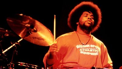 American musician, record producer, disc jockey, filmmaker, music journalist, and actor Questlove Ahmir Khalib Thompson, of the American hip hop band The Roots, plays on stage during JazzFest at The Knitting Factory in New York, New York, circa 2000. 