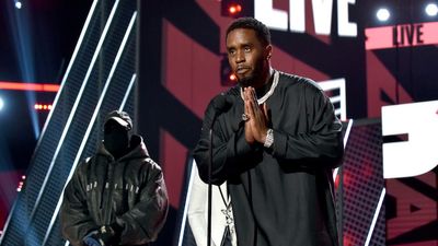 Honoree Sean 'Diddy' Combs accepts the Lifetime Achievement Award presented by Coke from Kanye West and Babyface onstage during the 2022 BET Awards at Microsoft Theater on June 26, 2022 in Los Angeles, California.
