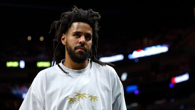 J Cole is seen in attendance during Game Three of the 2023 NBA Finals between the Denver Nuggets and the Miami Heat at Kaseya Center on June 07, 2023 in Miami, Florida.