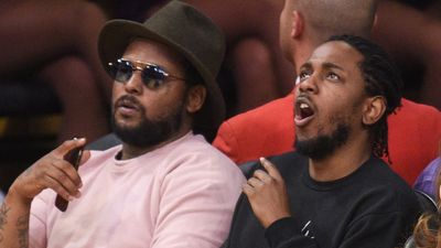 ScHoolboy Q (L) and Kendrick Lamar attend a basketball game between the Utah Jazz and the Los Angeles Lakers at Staples Center on April 13, 2016 in Los Angeles, California.