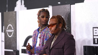 Young Thug and Gunna attend the 2021 BET Hip Hop Awards at Cobb Energy Performing Arts Center on October 01, 2021 in Atlanta, Georgia.