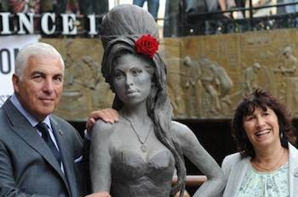 Life-Sized Statue Of UK Singer Amy Winehouse Unveiled In Camden, North London By Her Family & Sculptor Scott Eaton.