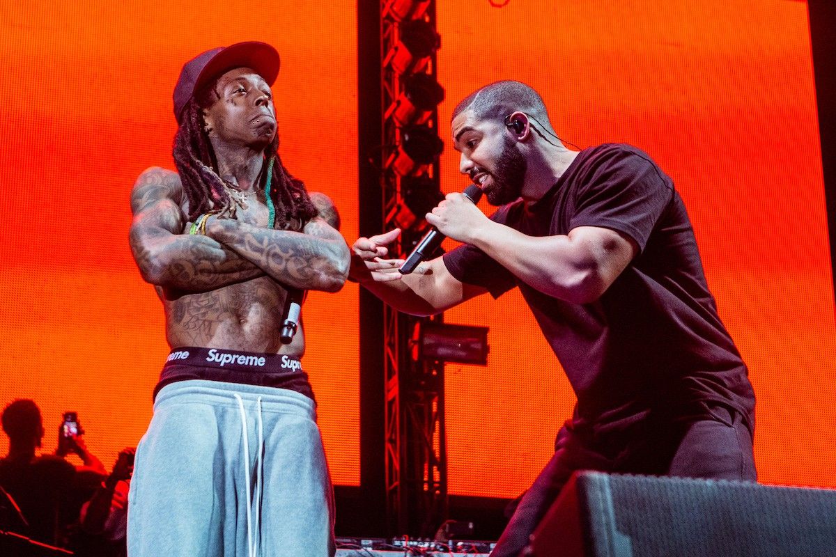 Lil Wayne (L) and Drake perform at Lil Weezyana Festival at Champions Square on August 28, 2015 in New Orleans, Louisiana (photo by Josh Brasted).