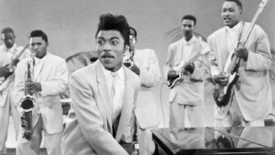 Little Richard performs onstage in circa 1956 (Photo by Michael Ochs Archives/Getty Images).