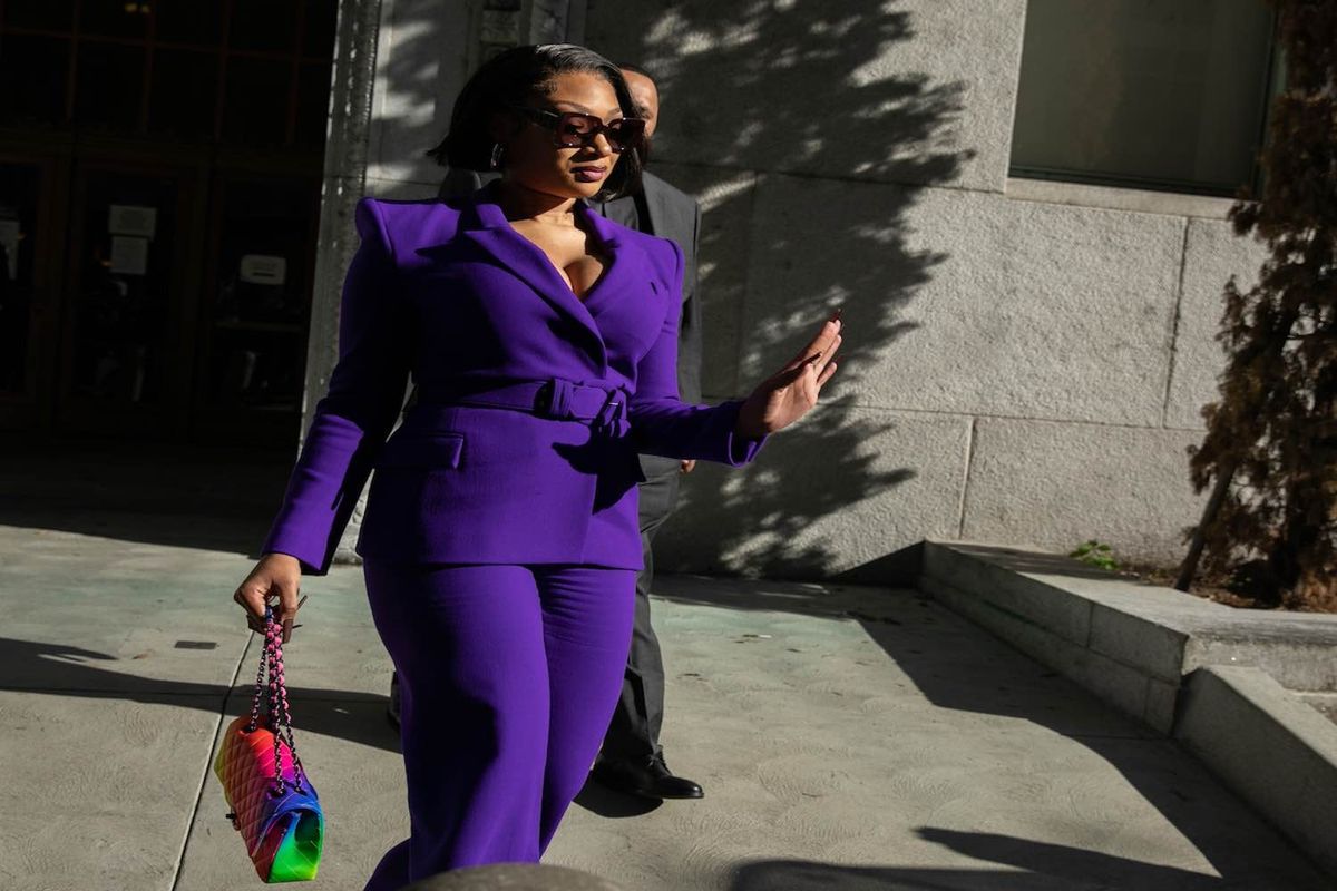 Megan Thee Stallion whose legal name is Megan Pete makes her way from the Hall of Justice to the courthouse to testify in the trial of Rapper Tory Lanez for allegedly shooting her on Tuesday, Dec. 13, 2022 in Los Angeles, CA.