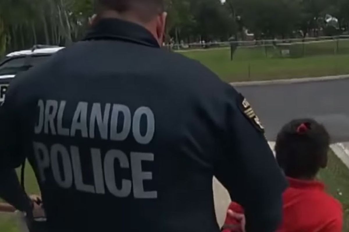 Orlando Police Officer Arresting Child
