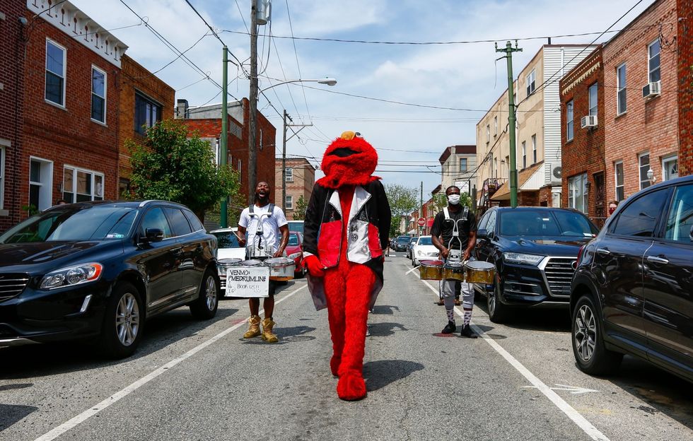 Philly Elmo Walking down the street