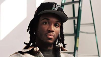 Press image of Saba with a hat on