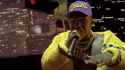 Rapper DaBaby preforming yellow jacket
