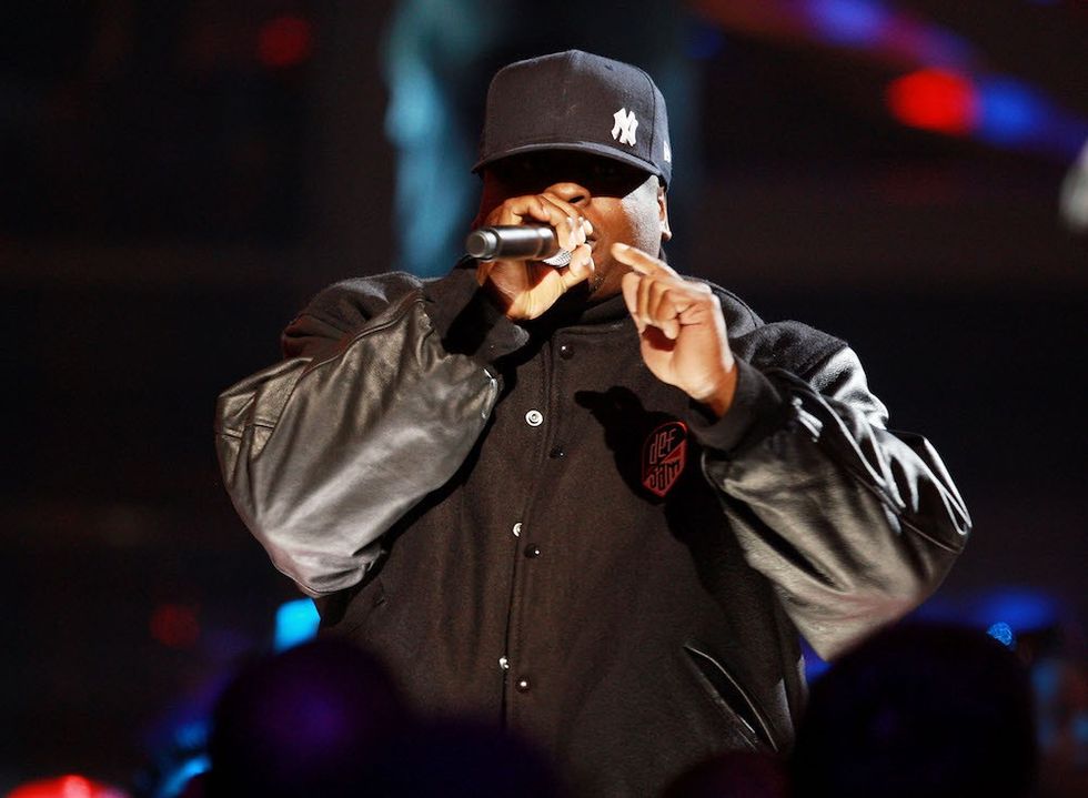 Rapper Scarface performing wearing black best rap verses