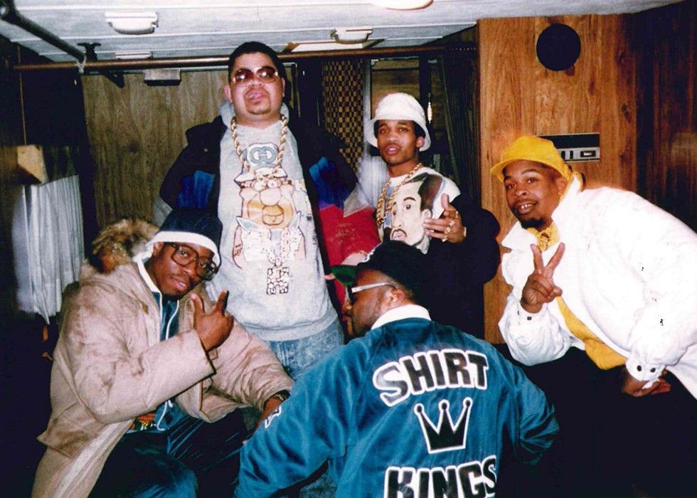 Rappers posing with shirt kings clothes