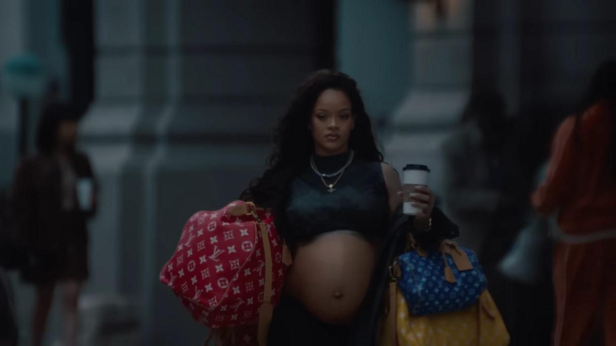 Rihanna Gets to the Bag In Pharrell Williams' Louis Vuitton Promo