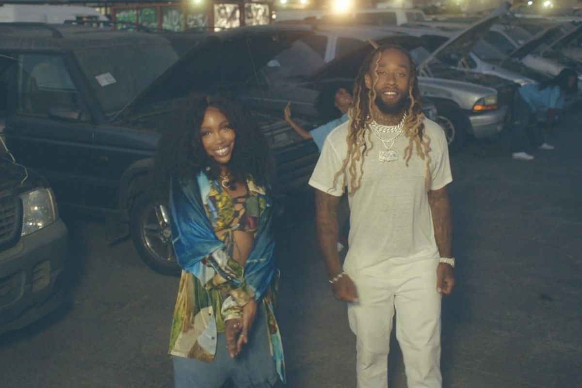 Singers SZA, wearing blue, and Ty Dolla $ign in all-white