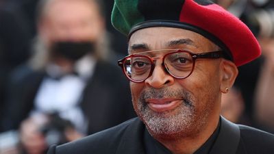 Spike Lee wearing colorful hat