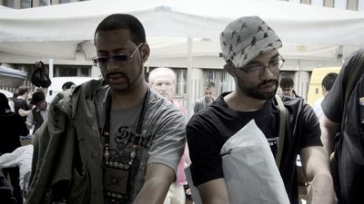 Stones Throw Records' Madlib and J. Rocc digging for records.