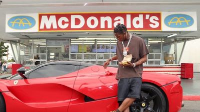 Travis scott surprises crew and customers at mcdonalds for the launch of the travis scott meal