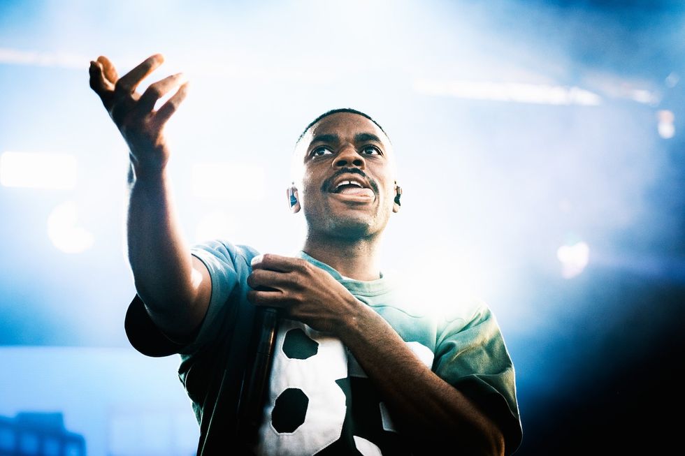 Vince Staples with hands out