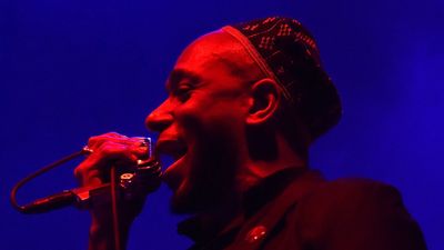 Yasiin Bey performs during the Black on Both Sides 20th Anniversary concert at The Greek Theatre