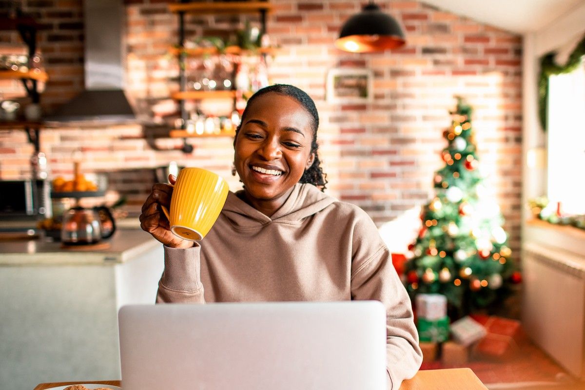 Young woman using a laptop during christmas