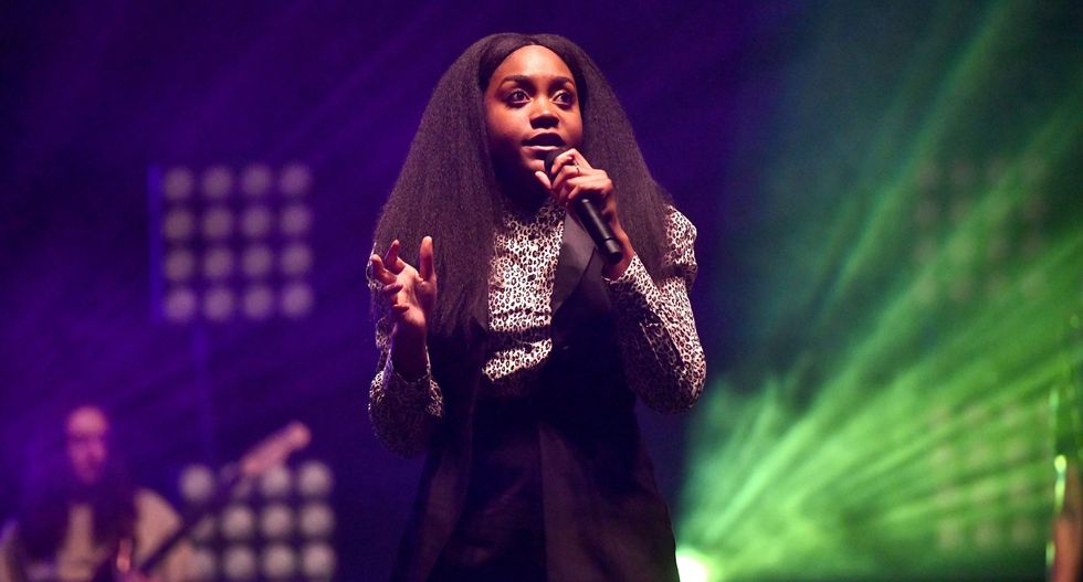 Noname performing