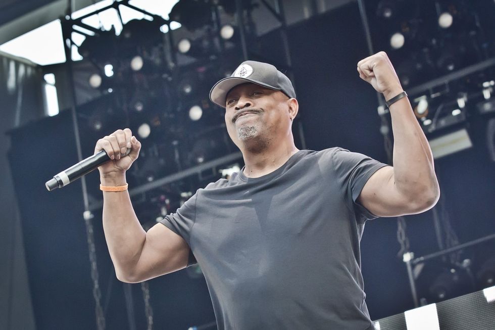 Chuck D with black shirt and black hat