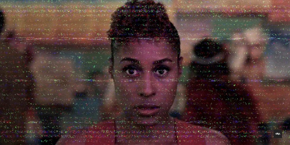 Issa Rae staring in a camera