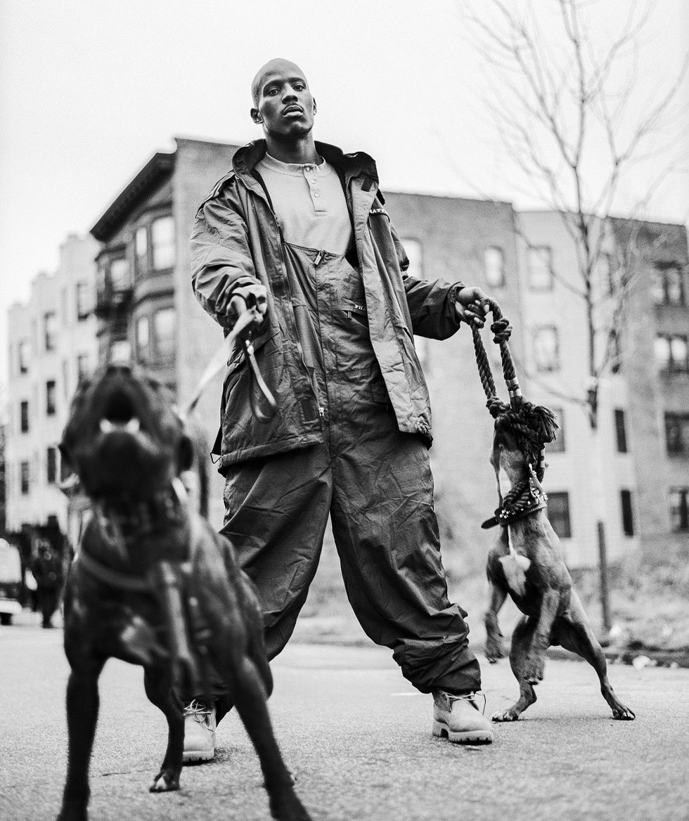 DMX holding dogs black and white 